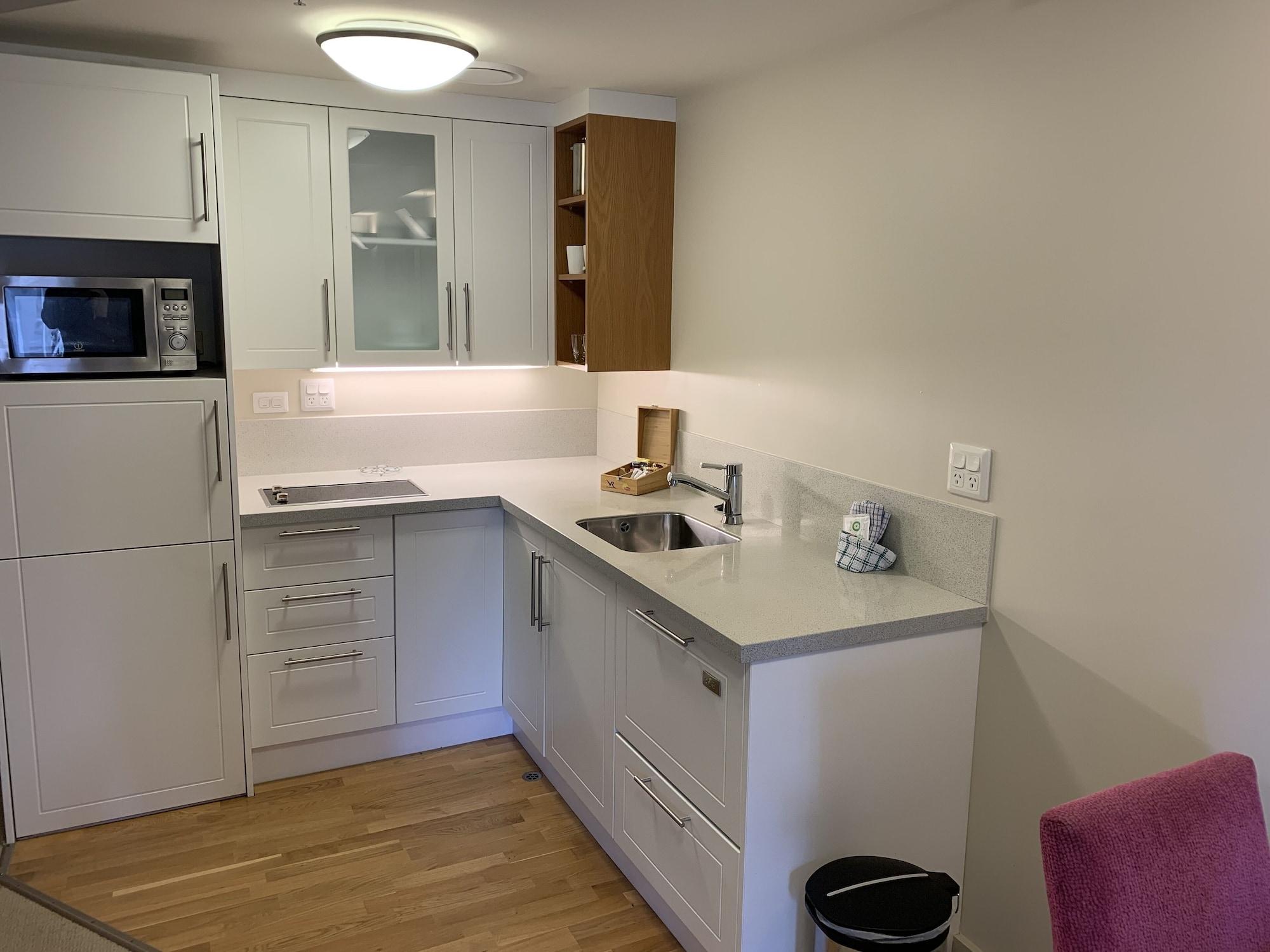 Vr Takapuna Auckland Esterno foto A typical kitchen in a student apartment